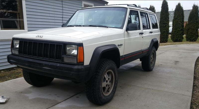 1996 Jeep XJ: the poor victim of a cracked cylinder head, and currently suffering from a broken engine mount bolt.